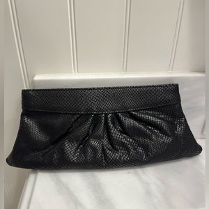Lauren Merlin clutch with tags
